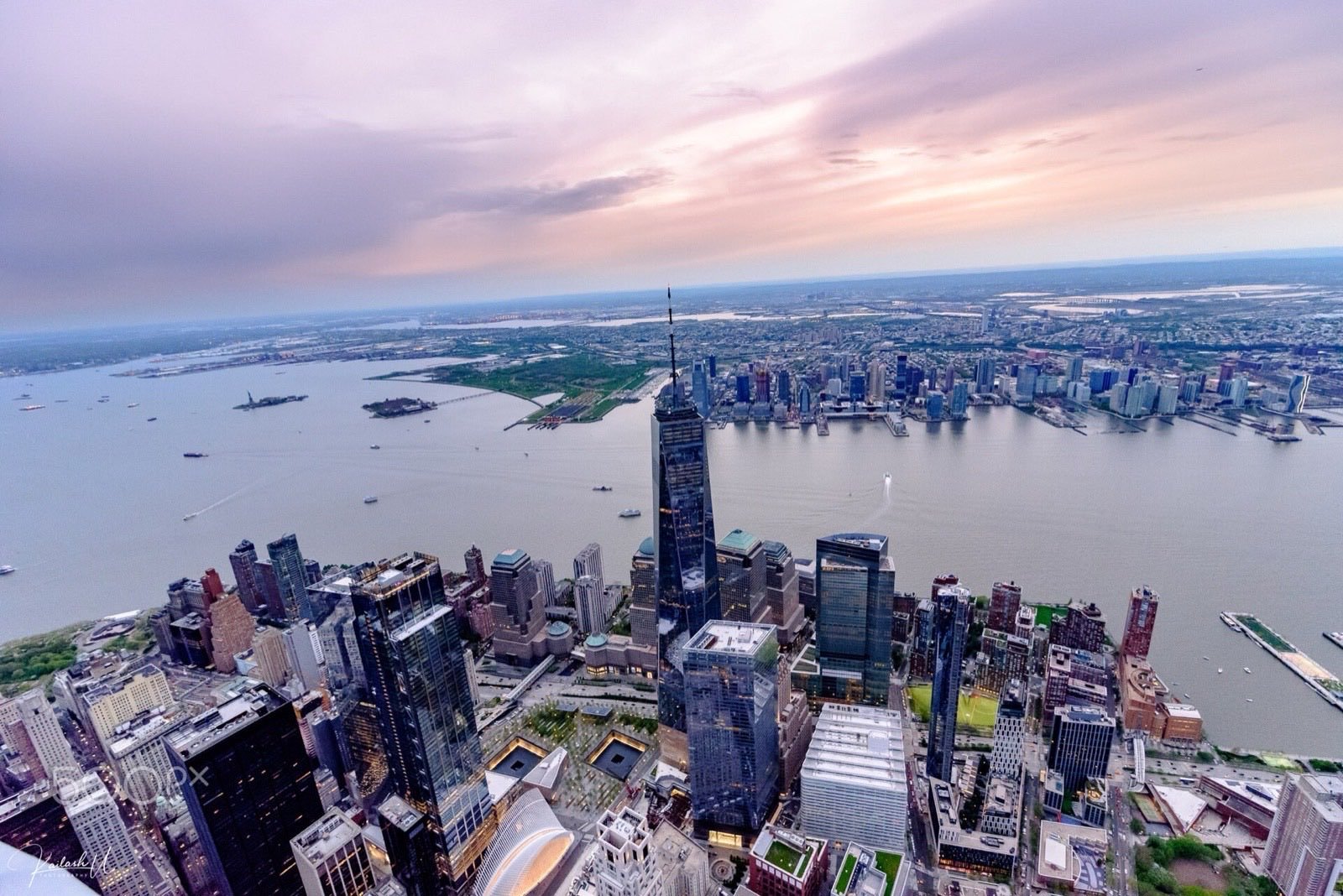 A metropolitan skyline at dusk.
